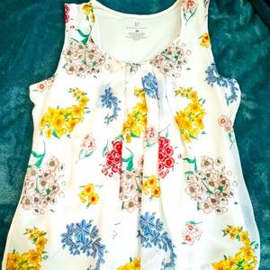 Floral sleeveless blouse in a brand new condition